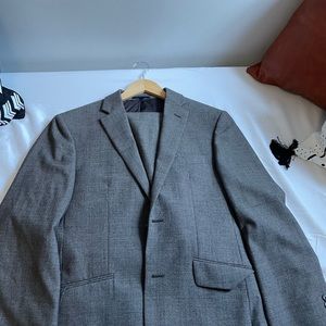 Jos a Bank herringbone suit. Size 38 blazer; 32 waist pant.